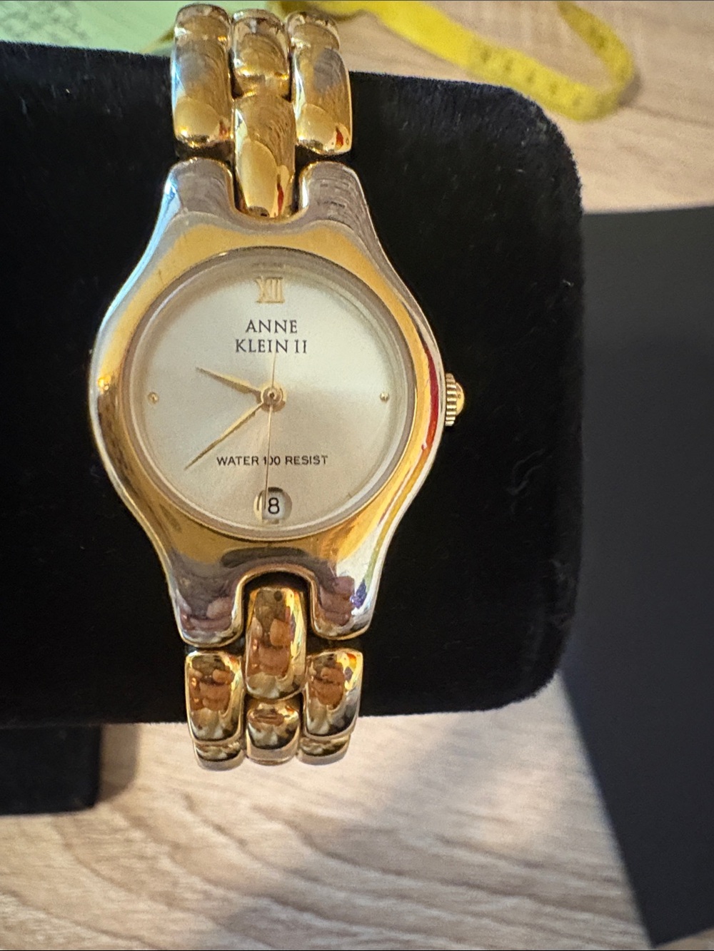 Anne Klein II Gold Tone Accent Bezel White Dial Quartz watch with minute hand